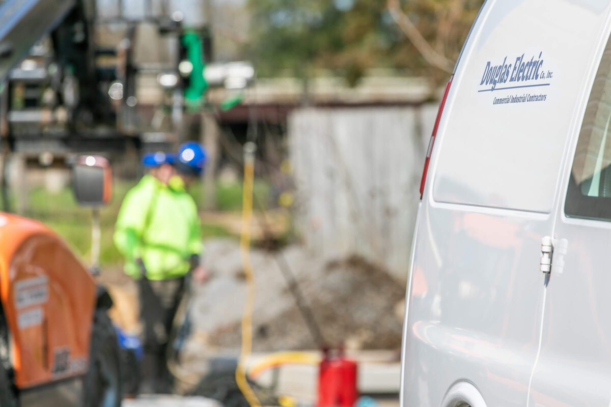 Douglas Electric van on job site